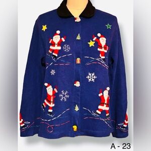 Onque Casual Blue Christmas Sweater Sz PM Santa Clauses Skating Black Collar